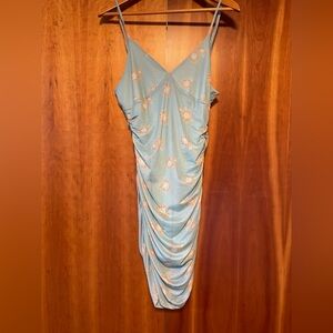 Light blue stretchy mini dress with daisies